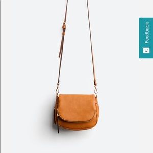 Super cute faux leather foldover zip crossbody. Barely used